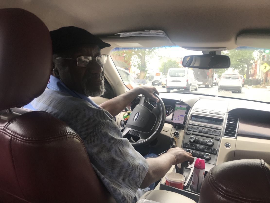 Lyft driver Charlie Weaver had his radio tuned to the hearing as he drove his Ford Taurus around Washington.