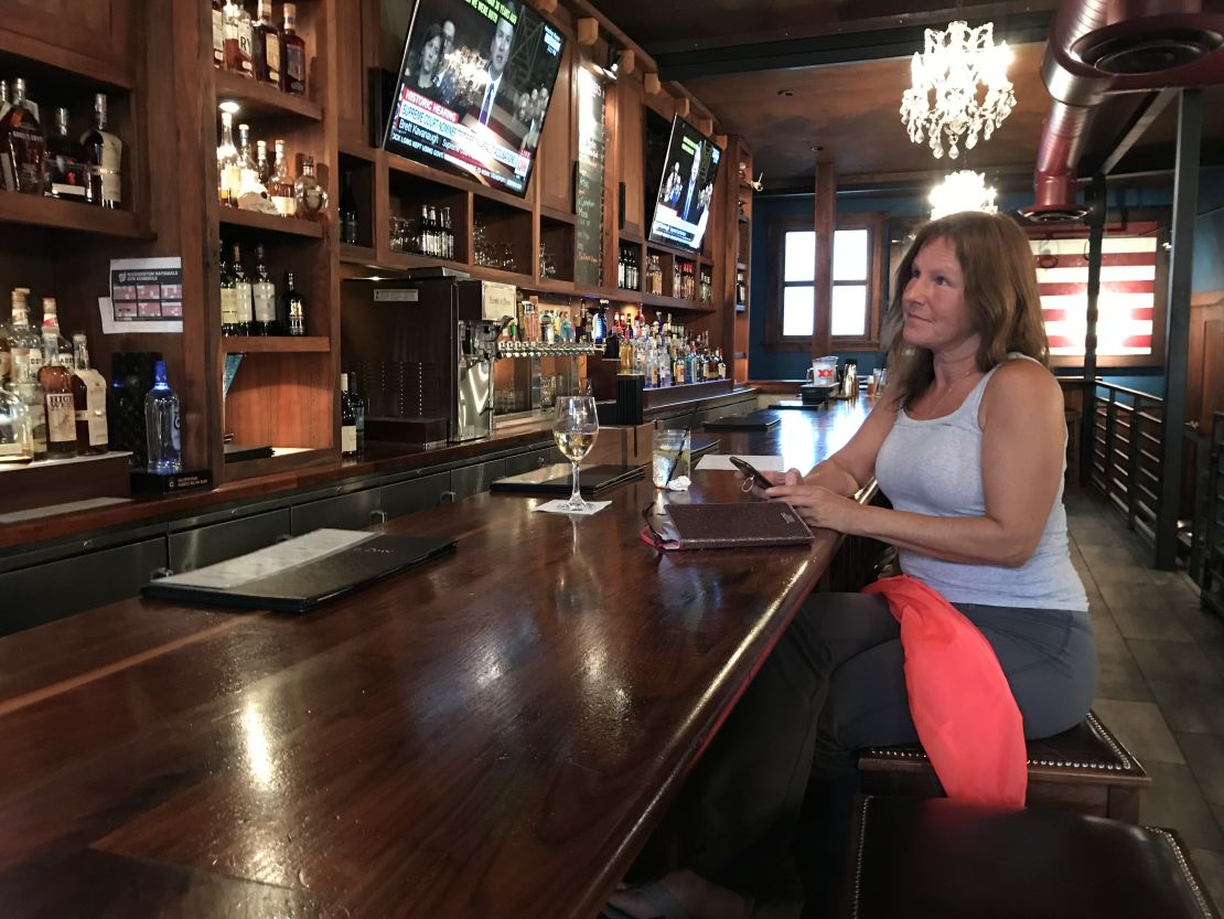 Valeria Georgescu watching the hearing at the Hawk 'n' Dove.