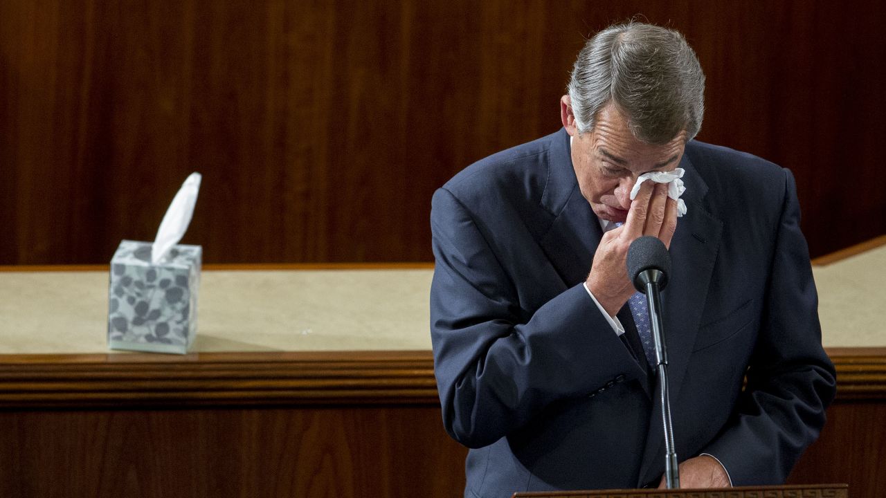 US House Speaker John Boehner wipes his eyes as he gives a farewell speech on October 29, 2015.
