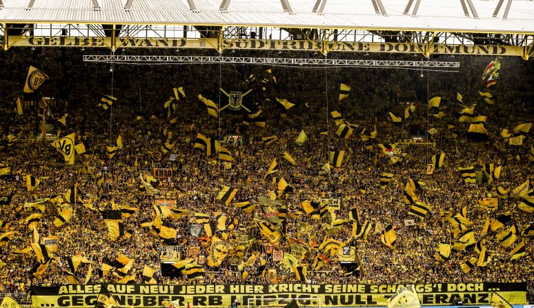 Borussia's Dortmund's Westfalenstadion Stadium is known for its "Yellow Wall." The south stand is packed full of impassioned fans who together create one of the most spell-binding sights in football. Dressed in the team's yellow and black, supporters create an intimidating atmosphere for the opposition.