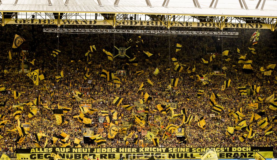 Borussia's Dortmund's Westfalenstadion Stadium is known for its "Yellow Wall." The south stand is packed full of impassioned fans who together create one of the most spell-binding sights in football. Dressed in the team's yellow and black, supporters create an intimidating atmosphere for the opposition.   