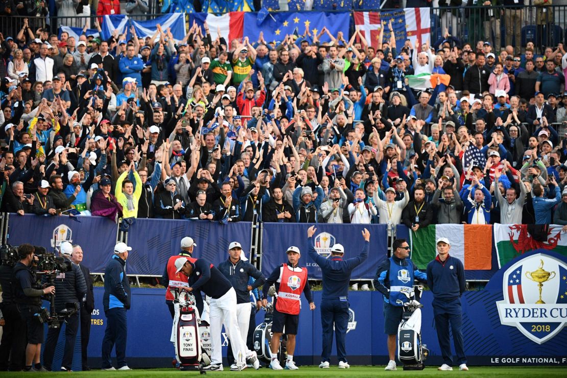 Europe's Jon Rahm revs up the crowd on the first tee at Le Golf National.