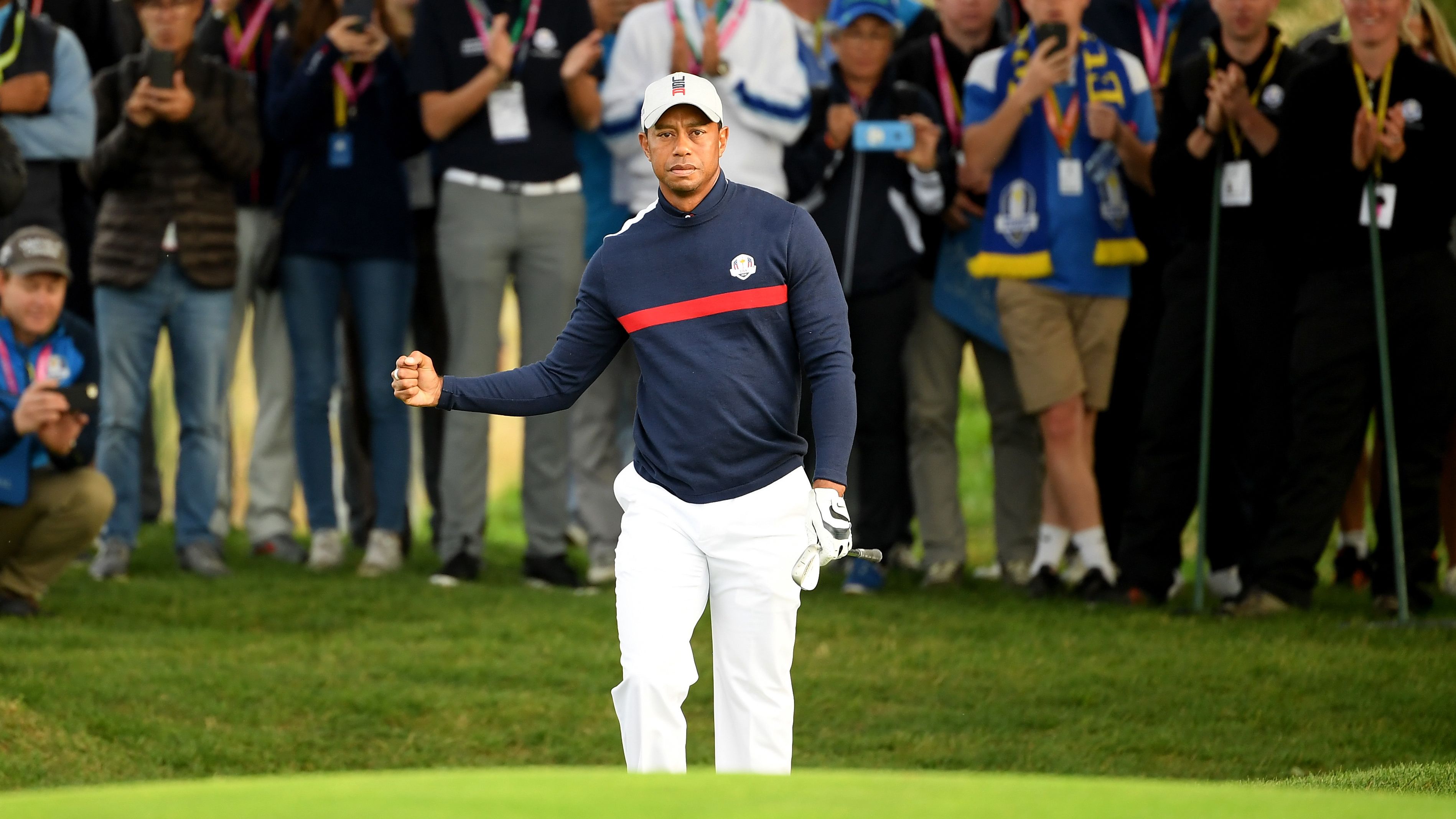 Woods is playing at the Ryder Cup for the first time since 2012. 