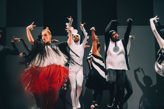 Elaborate dress-up costume has long been a hallmark of Jean Paul Gaultier's work. Here dancers wear costumes designed by Gaultier for the show which take a Sixties slant. 