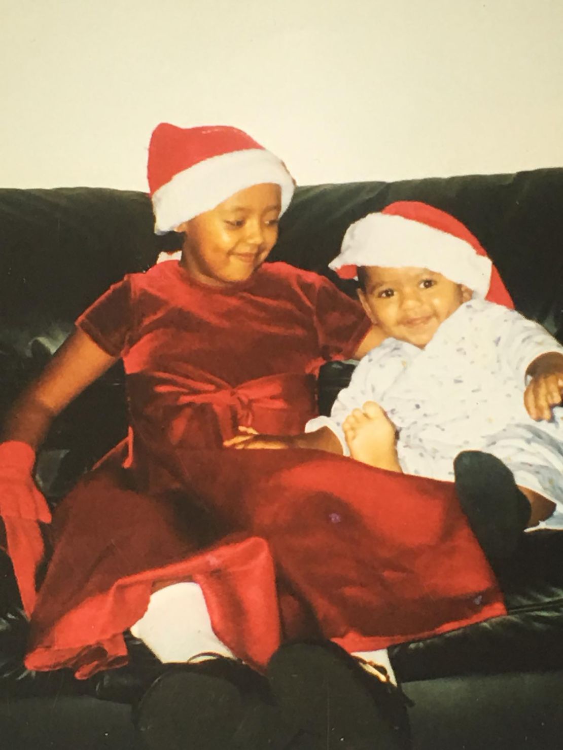 Ciham Ali Ahmed and her younger brother celebrate Christmas.