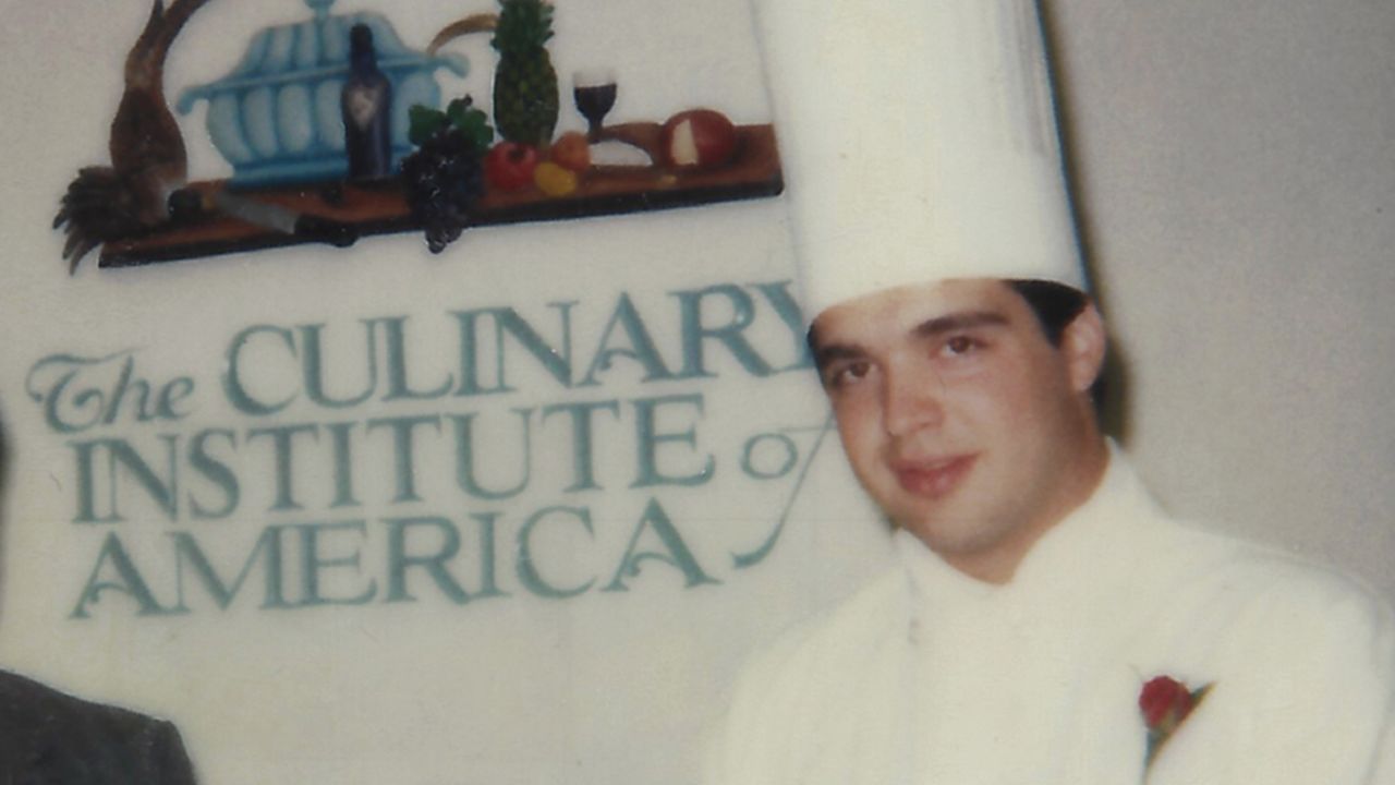 Mitchell, pictured after graduating from the Culinary Institute of America.
