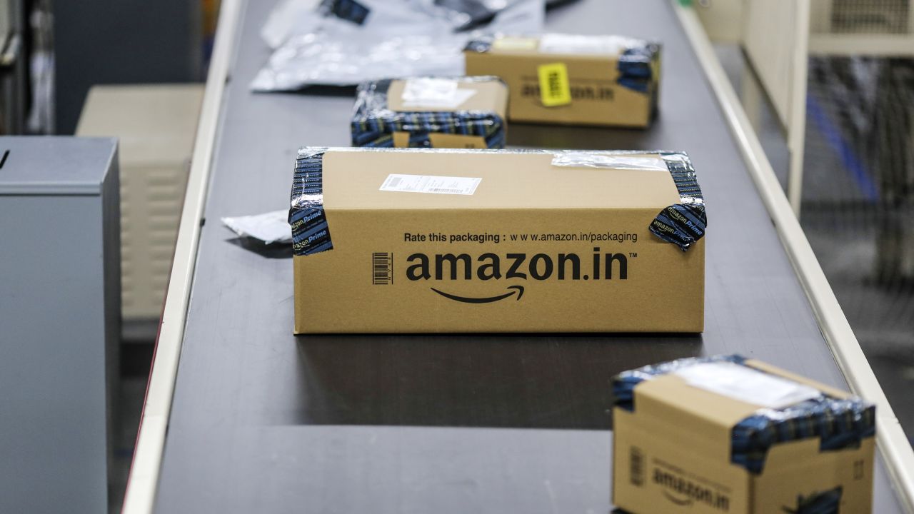 Packages move along a conveyor belt at the Amazon.com Inc. fulfillment center in Hyderabad, India.