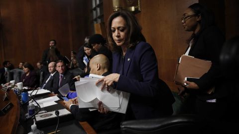 WASHINGTON, DC - SEPTEMBER 28: Sen. Kamala Harris (D-CA) packs her belongings as she walks out of a Senate Judiciary Committee meeting due to a break in "regular order" of the committee on September 28, 2018 in Washington, DC. The committee met to discuss and later vote on the nomination of Judge Brett Kavanaugh to the U.S. Supreme Court prior to the nomination proceeding to a vote in the full U.S. Senate. (Photo by Win McNamee/Getty Images)