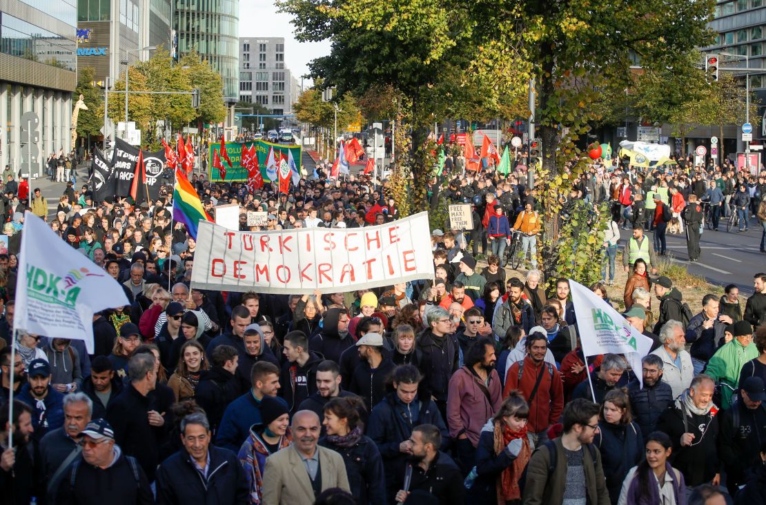 Hundreds of people gathered in Berlin Friday to demonstrate against President Erdogan and his visit to Germany.
