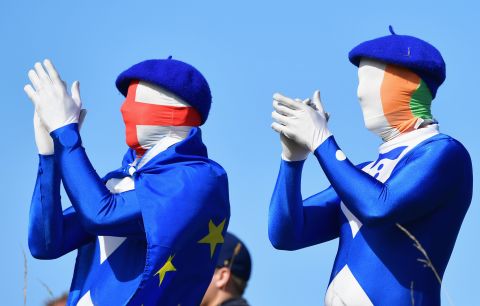 European fans applaud Saturday during the foursomes matches.