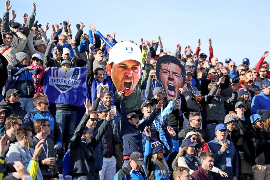 European fans display giant pictures of Rory McIlroy and Sergio Garcia during the Saturday morning four-ball matches. 