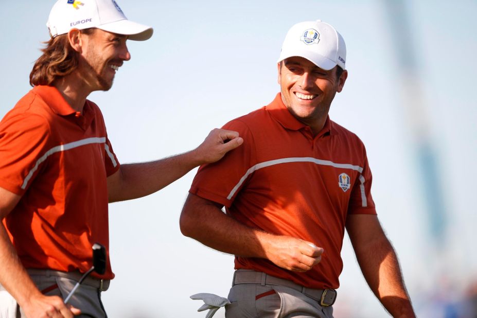 Team Europe's Francesco Molinari and Tommy Fleetwood talk Saturday during the foursomes matches.