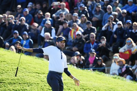 Bubba Watson of the United States reacts after playing his fourth shot on the ninth hole during the Saturday afternoon foursomes matches.