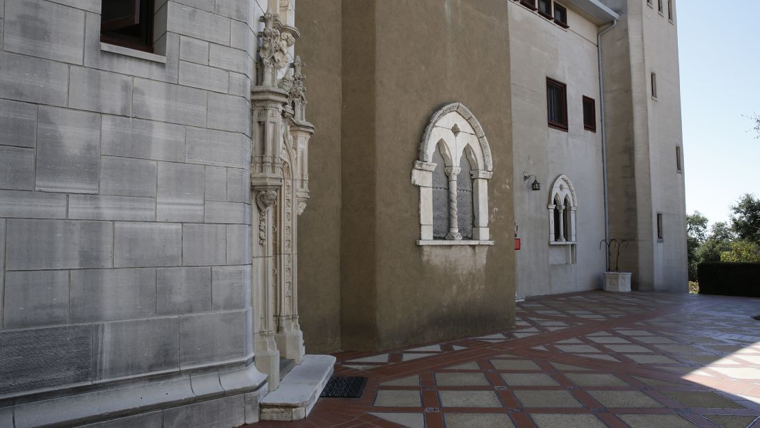 An exterior wall of Casa Grande stands frozen in three stages of development.