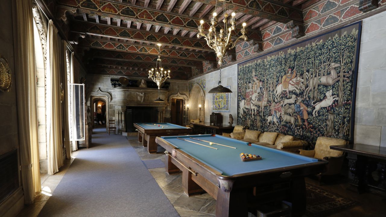 <strong>Fine art in casual rooms. </strong>This tapestry from the Hunt of the Unicorn series hangs in the billiards room. It was made in France around 1500 AD.