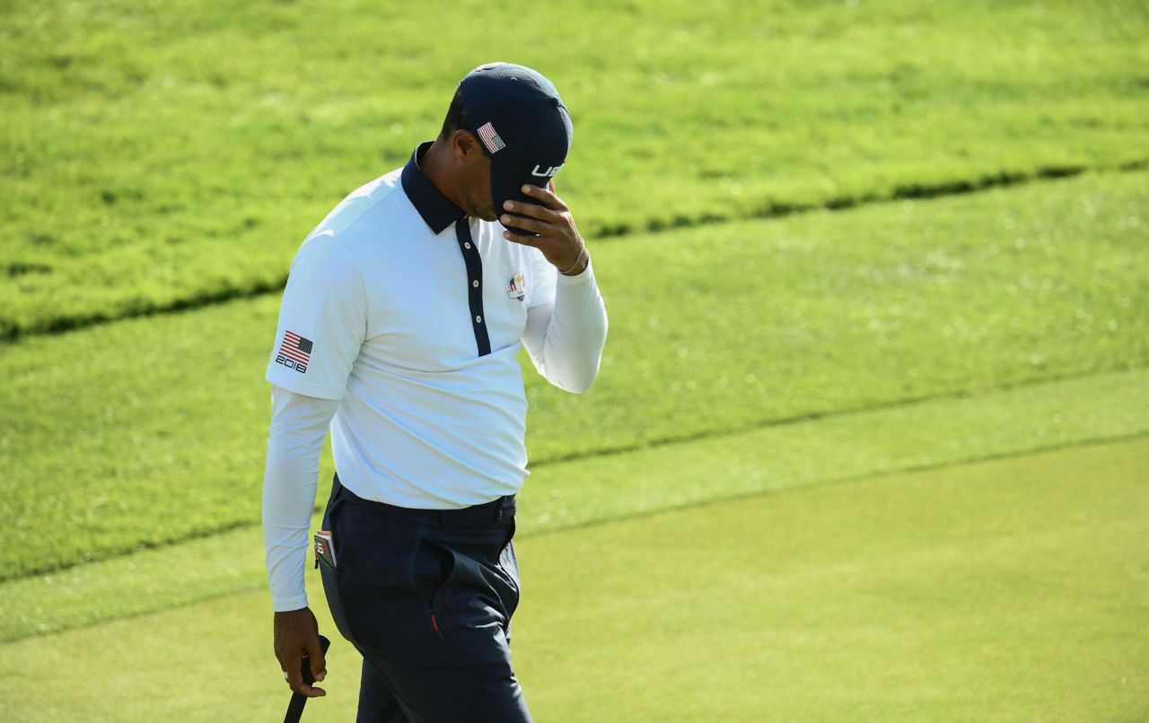 Tiger Woods reacts after losing his foursomes match on Day Two of the Ryder Cup on Saturday.
