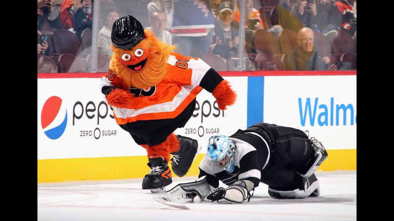 The Philadelphia Flyers mascot Gritty skates between periods of a hockey game on Thursday, September 27, in Philadelphia.