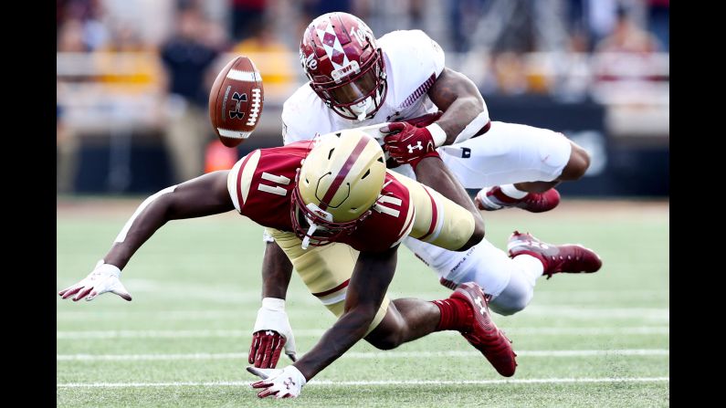 CJ Lewis of the Boston College Eagles is tackled by Chapelle Russell of the Temple Owls during the second half of the football game on Saturday, September 29, in Chestnut Hill, Massachusetts.