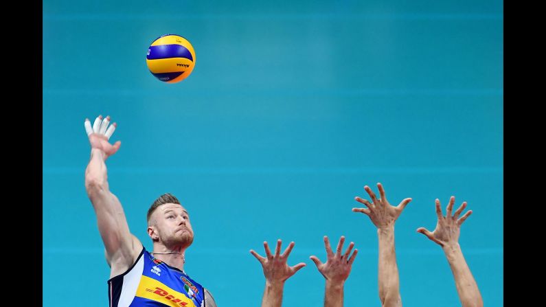 Italy's Ivan Zaytsev hits the ball during a  match against Poland in the Volleyball World Cup on Friday, September 28, in Turin, Italy.
