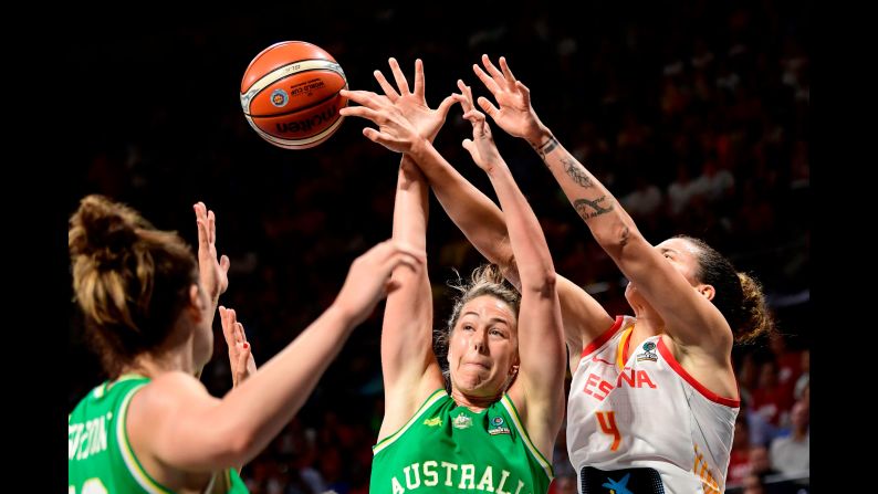Australia guard Jenna O'Hea vies with Spain forward Laura Nicholls during their FIBA Women's Basketball World Cup match in San Cristobal de la Laguna, Tenerife, on Saturday, September 29.