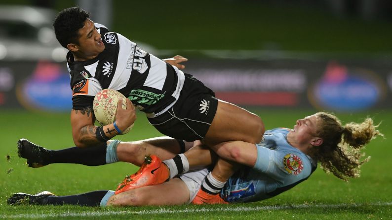 Jamie-Jerry Taulagi of Hawke's Bay is tackled by Scott Gregory of Northland during a Mitre 10 Cup rugby match on Wednesday, September 26, in Napier, New Zealand.