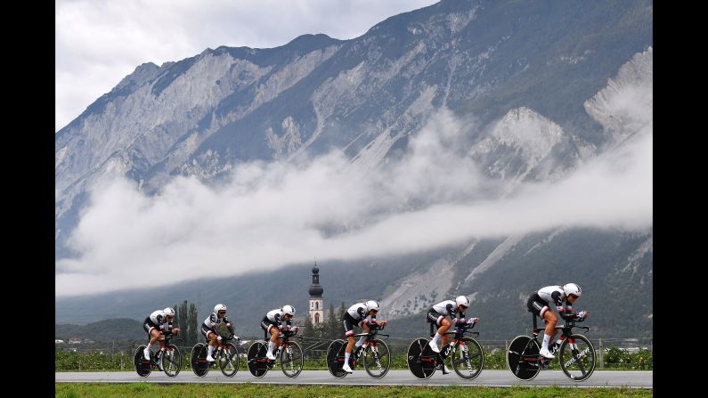 Cyclists race through Innsbruck, Austria, in the UCI team time trial on Sunday, September 23. <a href="index.php?page=&url=https%3A%2F%2Fwww.cnn.com%2F2018%2F09%2F23%2Fsport%2Fgallery%2Fwhat-a-shot-sports-0923%2Findex.html" target="_blank">See 27 amazing sports photos from last week</a>.