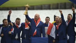 (L-R) Europe's English golfer Tyrrell Hatton, English golfer Paul Casey, Spanish golfer Sergio Garcia,  Danish captain Thomas Bjorn, Northern Irish golfer Rory McIlroy, Swedish golfer Alexander Noren, Danish golfer Thorbjorn Olesen and English golfer Ian Poulter celebrate with the trophy after winning the 42nd Ryder Cup at Le Golf National Course at Saint-Quentin-en-Yvelines, south-west of Paris, on September 30, 2018. (Photo by Eric FEFERBERG / AFP)        (Photo credit should read ERIC FEFERBERG/AFP/Getty Images)