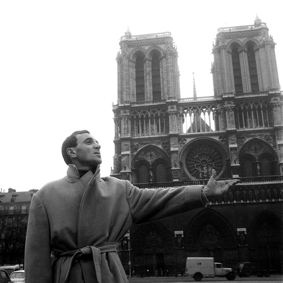 Charles Aznavour in front of Notre Dame de Paris. 
