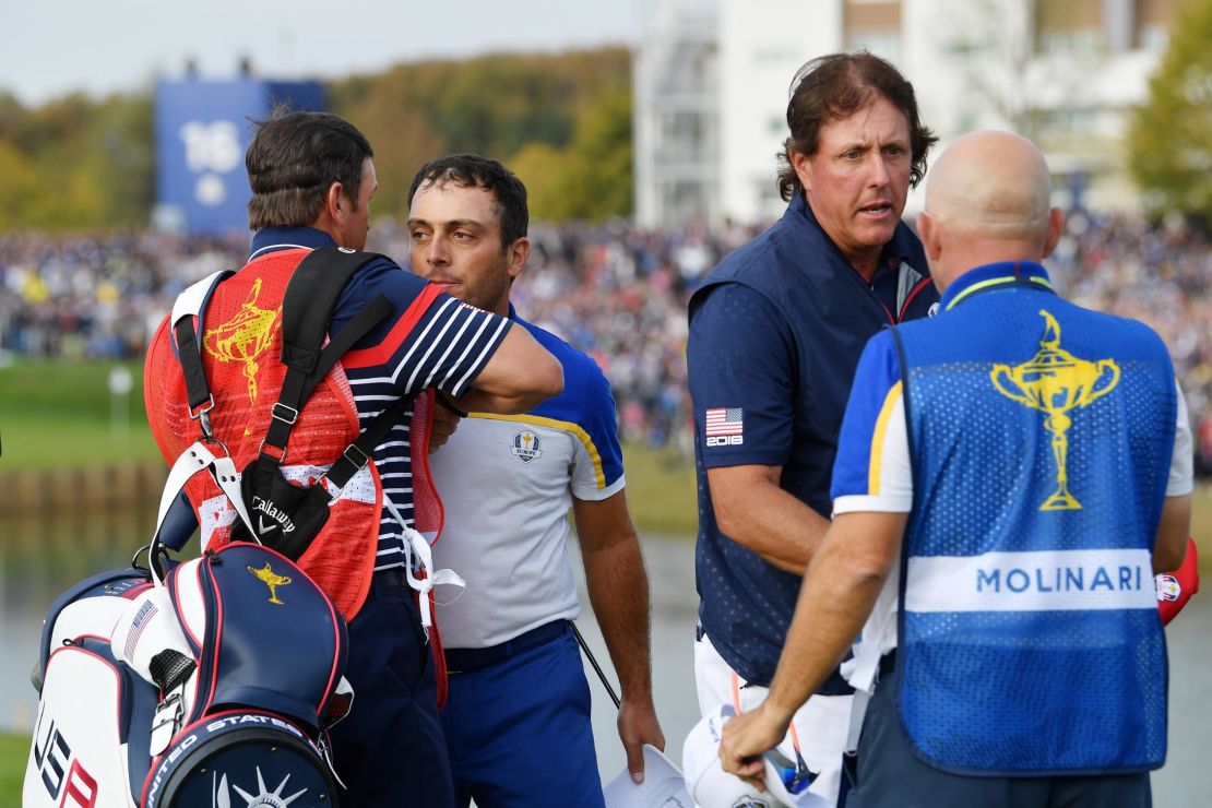 Phil Mickelson concedes the match that confirmed a European triumph.
