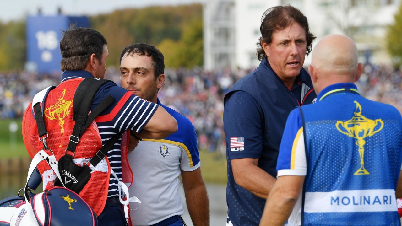 Phil Mickelson concedes the match that confirmed a European triumph. 