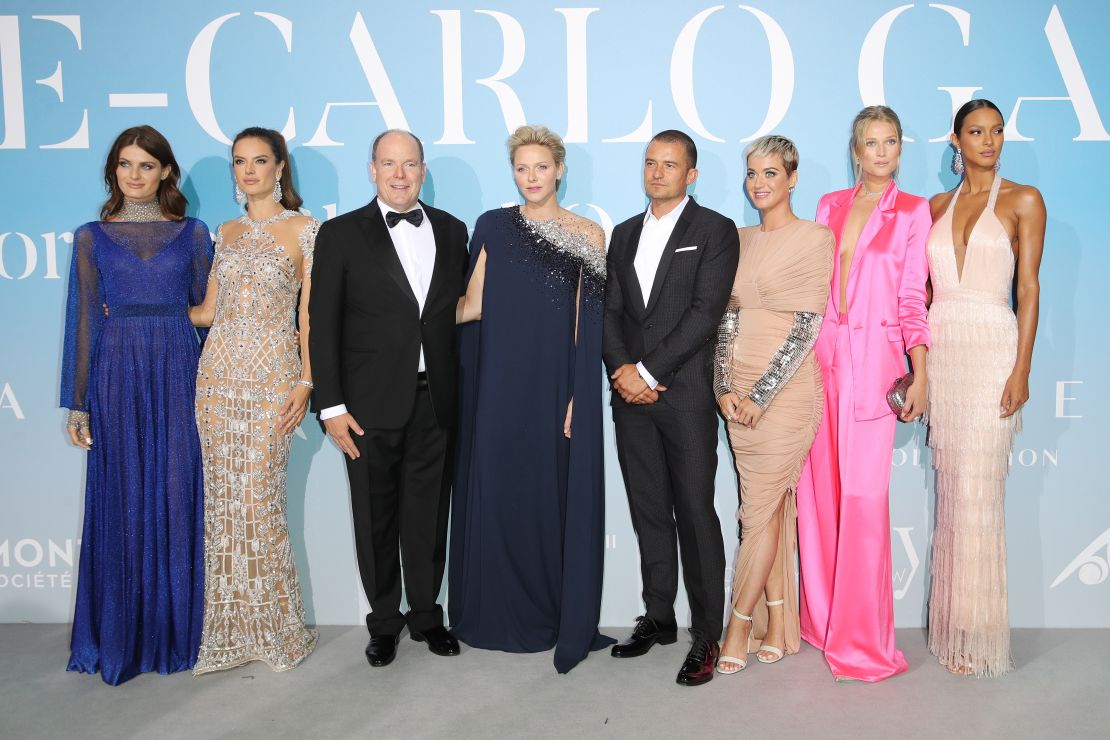 Prince Albert II and Princess Charlene of Monaco pose with models, singer Katy Perry and Orlando Bloom, winner of the 2017 gala's environmental award.