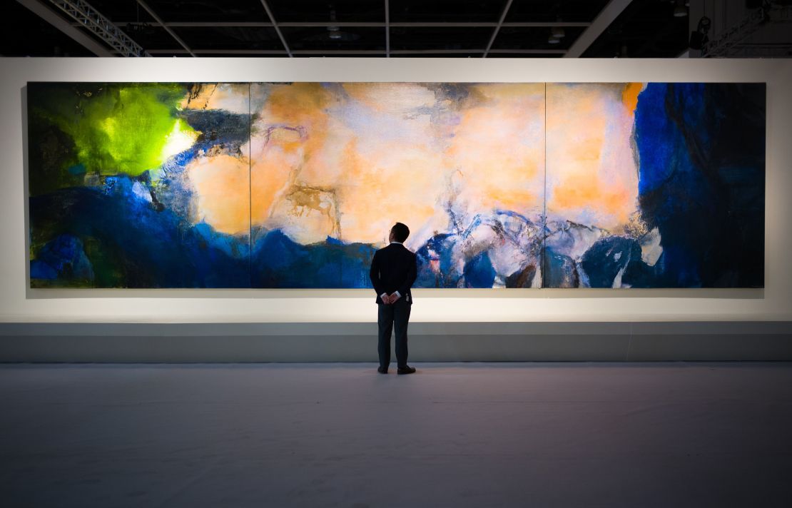"Juin-Octobre 1985" pictured at the Sotheby's auction house showroom in Hong Kong before selling for a record $65 million.