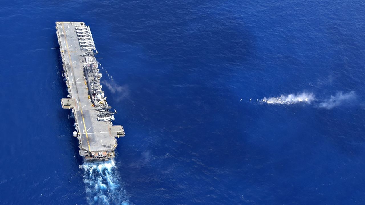The amphibious assault ship USS Wasp performs maneuvers on Thursday, September 27.