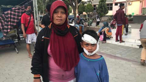 Nurjati Katili is taking care of her 7-year-old nephew Mohammedwhile they search for his mother and little brother.