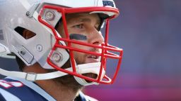 New England Patriots quarterback Tom Brady looks on during the second half against the Miami Dolphins on September 30, 2018.