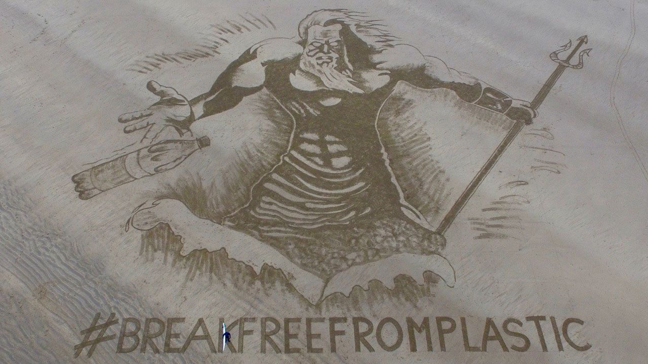 <strong>Environmental angle</strong>: "This year I've worked with local councils here improving their tourism push, and I've worked for the European Environment Bureau, along with three other sand artists in Europe actually, and we all did this piece to do with bringing awareness to plastic pollution in the oceans," says Treanor. <em>Pictured here: Sand art, European Environment Bureau, Saunton Sands, North Devon</em>