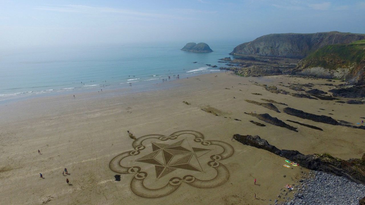 Sand art at Traeth Llyfn beach, Pembrokeshire, Wales
