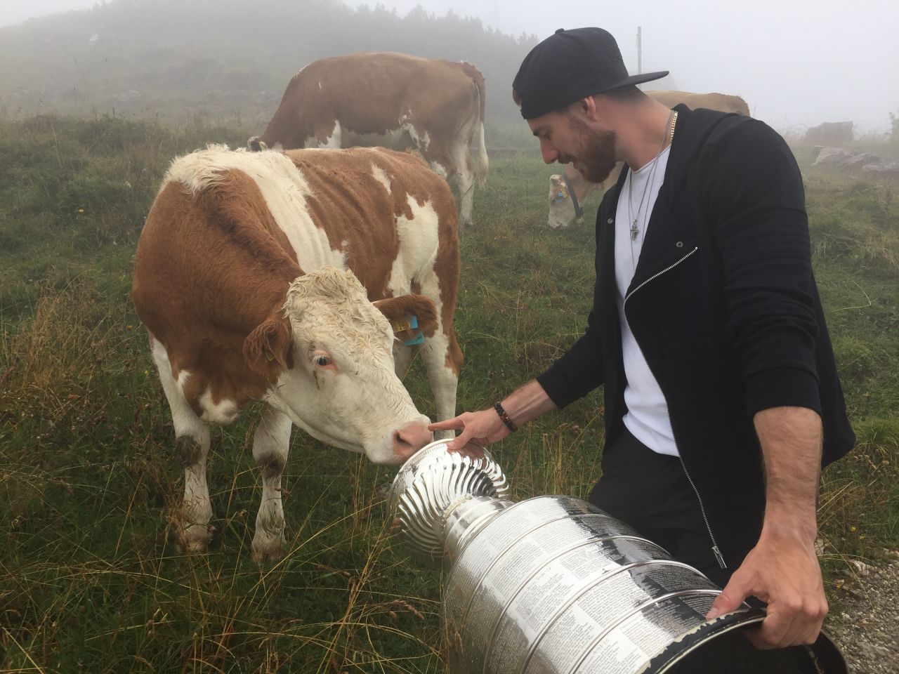 Goaltender Philipp Grubauer -- who has since been traded to the Colorado Avalanche -- brought the Stanley Cup to Rosenheim, Germany. Here he shares a moment with a Bavarian bovine.