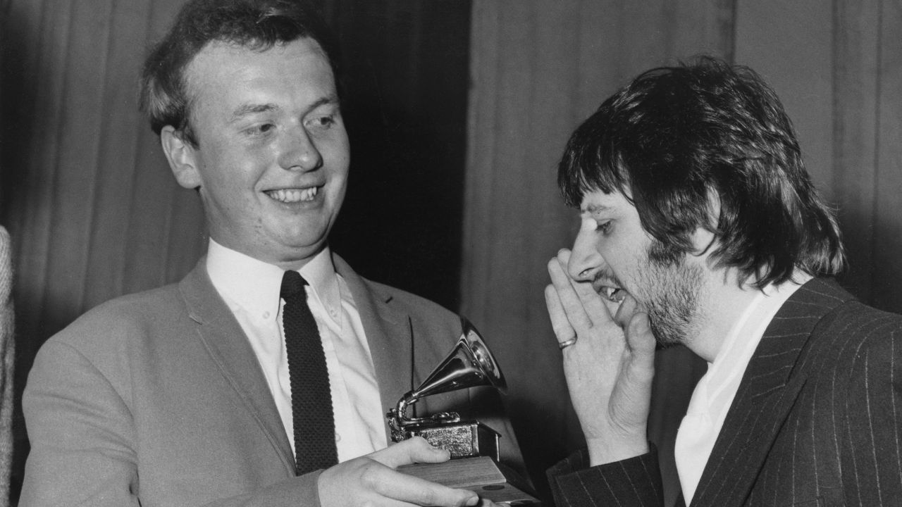 Ringo Starr congratulates Geoff Emerick on his Grammy Award at Abbey Road studios in March 1968.