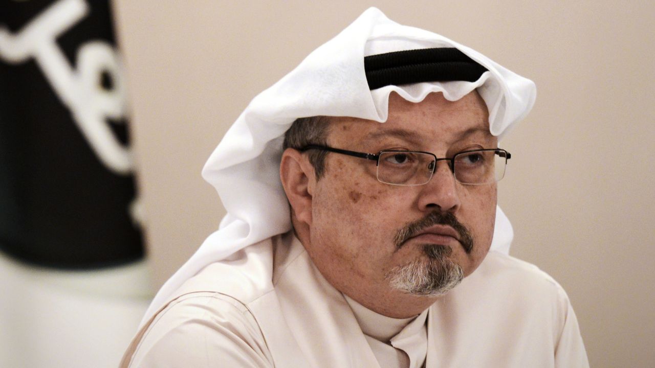 Jamal Khashoggi looks on during a news conference in Bahrain on December 15, 2014.