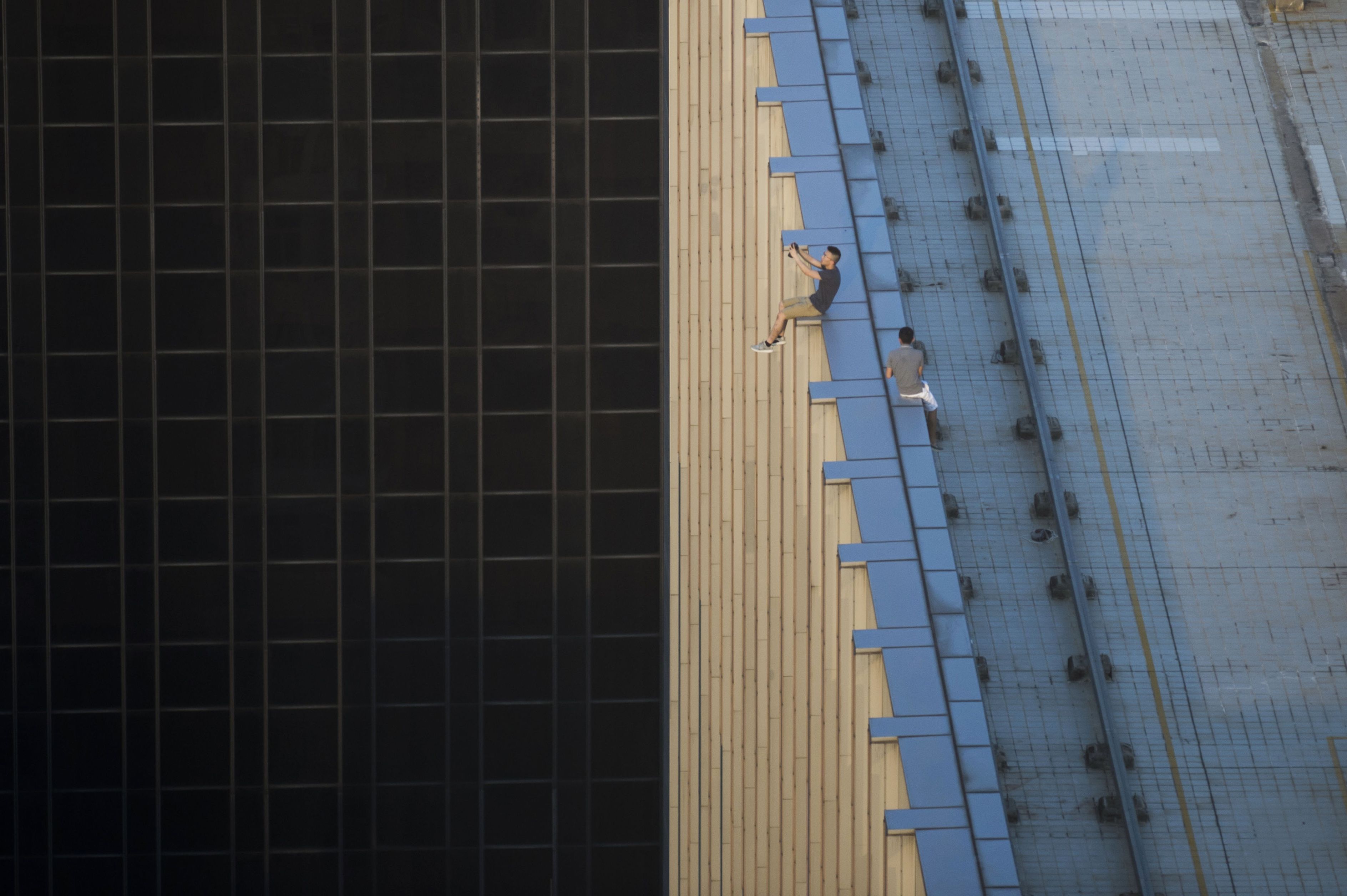people falling off buildings