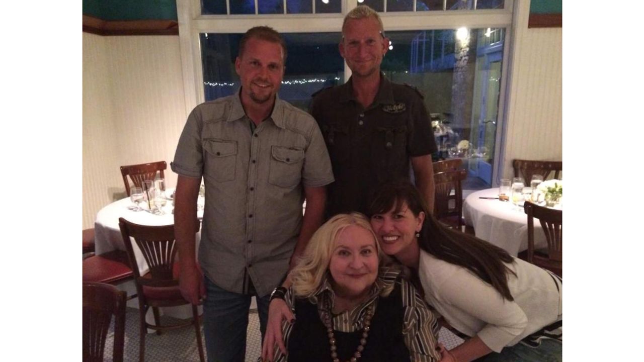 Kathy Felt with her two sons, Todd, left, and Chad, and a cousin.