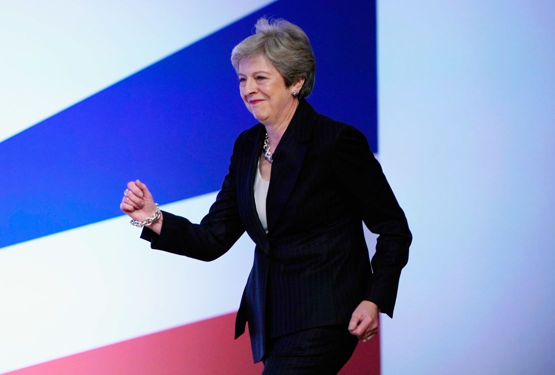 Theresa May strikes a pose.