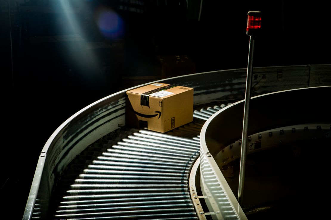 Ready for shipment. A package runs down the conveyor belt in a Kent, Washington, fulfillment center.