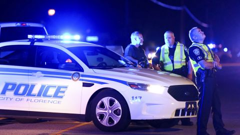 Authorities direct traffic Wednesday near the shooting scene in Florence, South Carolina.