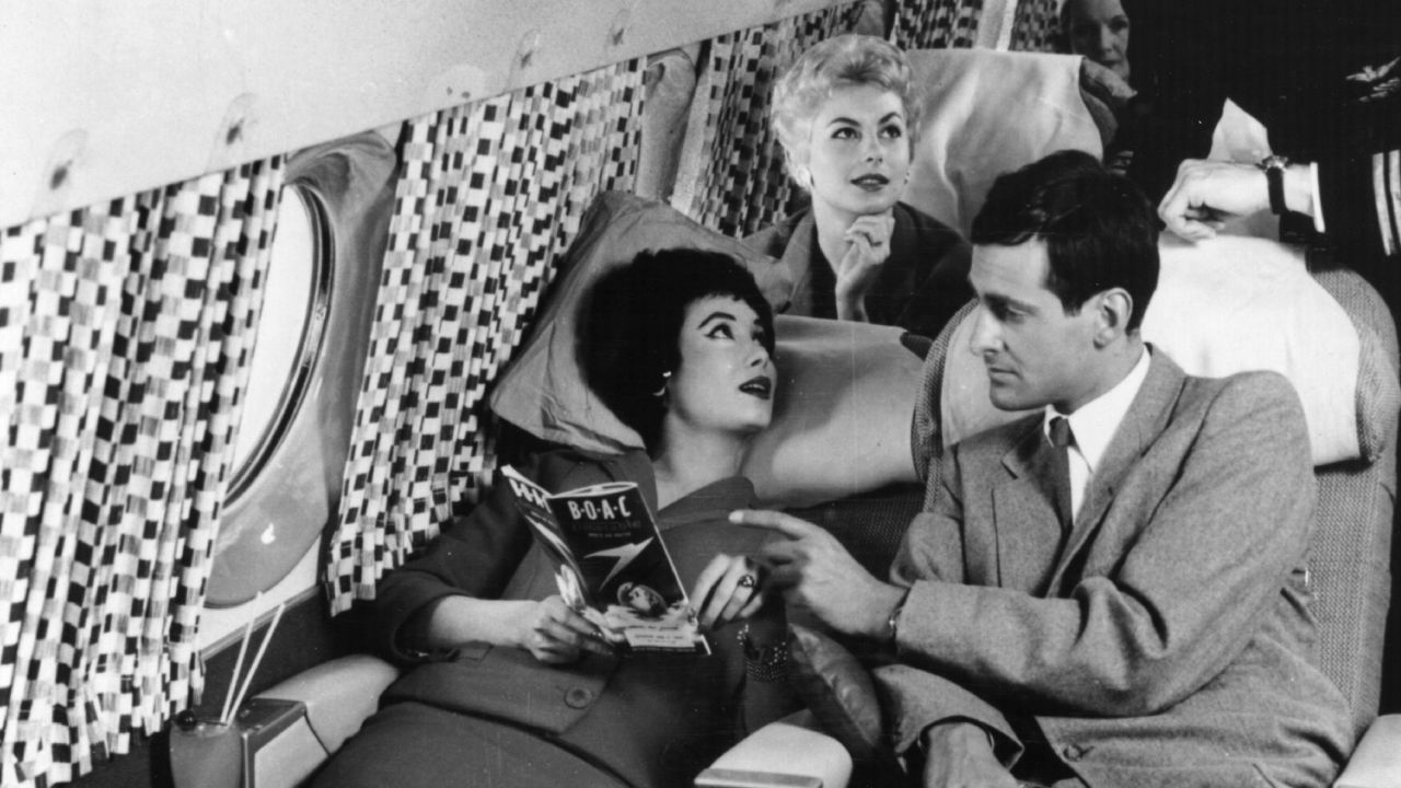 <strong>Luxury travel:</strong> Air travel in the mid-twentieth century was an opulent affair. Pictured here are passengers relaxing on the sleeper seats in the new Comet 4 during a demonstration flight at Hatfield (a British airfield), prior to the inaugural flight.