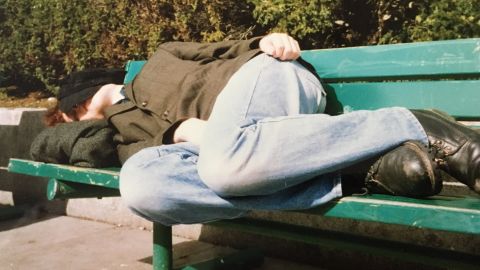 Stuart Murdoch rests on a park bench during a visit to the United States.