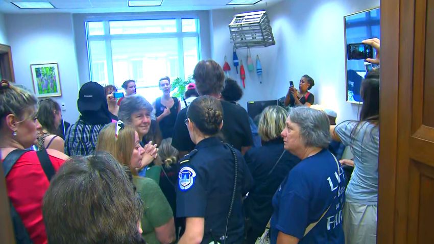 Collins office protester