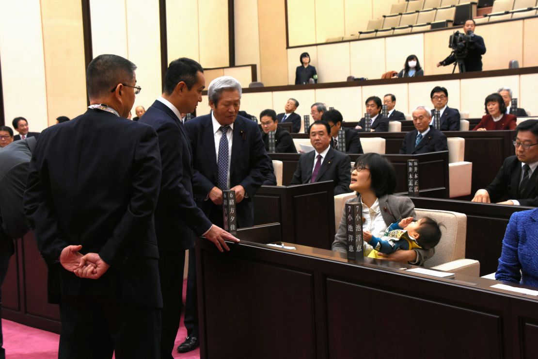 Lawmaker Yuka Ogata was forced to leave a Kumamoto city council session in 2017 after she tried to bring her infant son in with her. 
