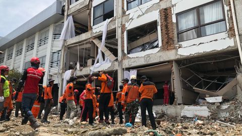 Rescuers looking for survivors in the Mercure hotel in Palu on Thursday, October 4